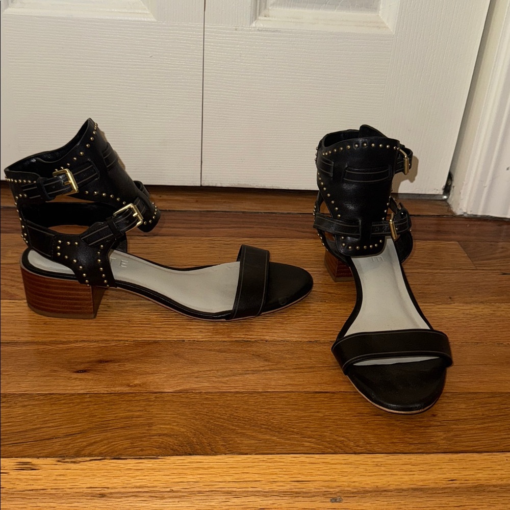1. STATE black Strappy Sandals with Gold Accents